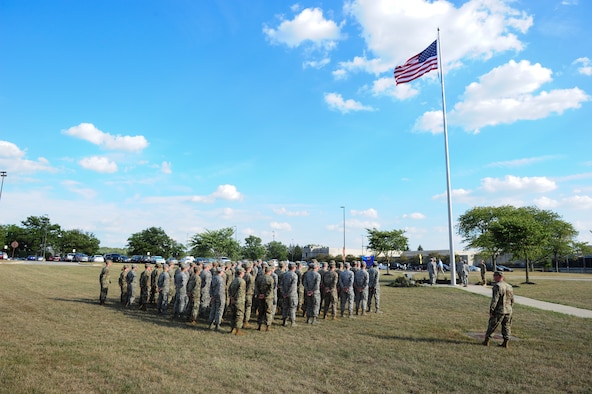 Members of the National Air and Space Intelligence Center, Global Exploitation Intelligence Group conduct a Retreat Ceremony on Oct. 1, 2019 at Wright-Patterson Air Force Base, Ohio. A Retreat Ceremony serves a twofold purpose. It signals the end of the official duty day and serves as a ceremony for paying respect to the flag.