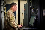 Senior Master Sgt. Nick Wirwille, superintendent of the Cyber Systems Operations shop with the 179th Airlift Wing Communications Squadron, Mansfield, Ohio, works on a computer Oct. 6, 2019. Cyber Systems Operations specialists design, install and support systems to ensure they operate properly and remain secure from outside intrusion.