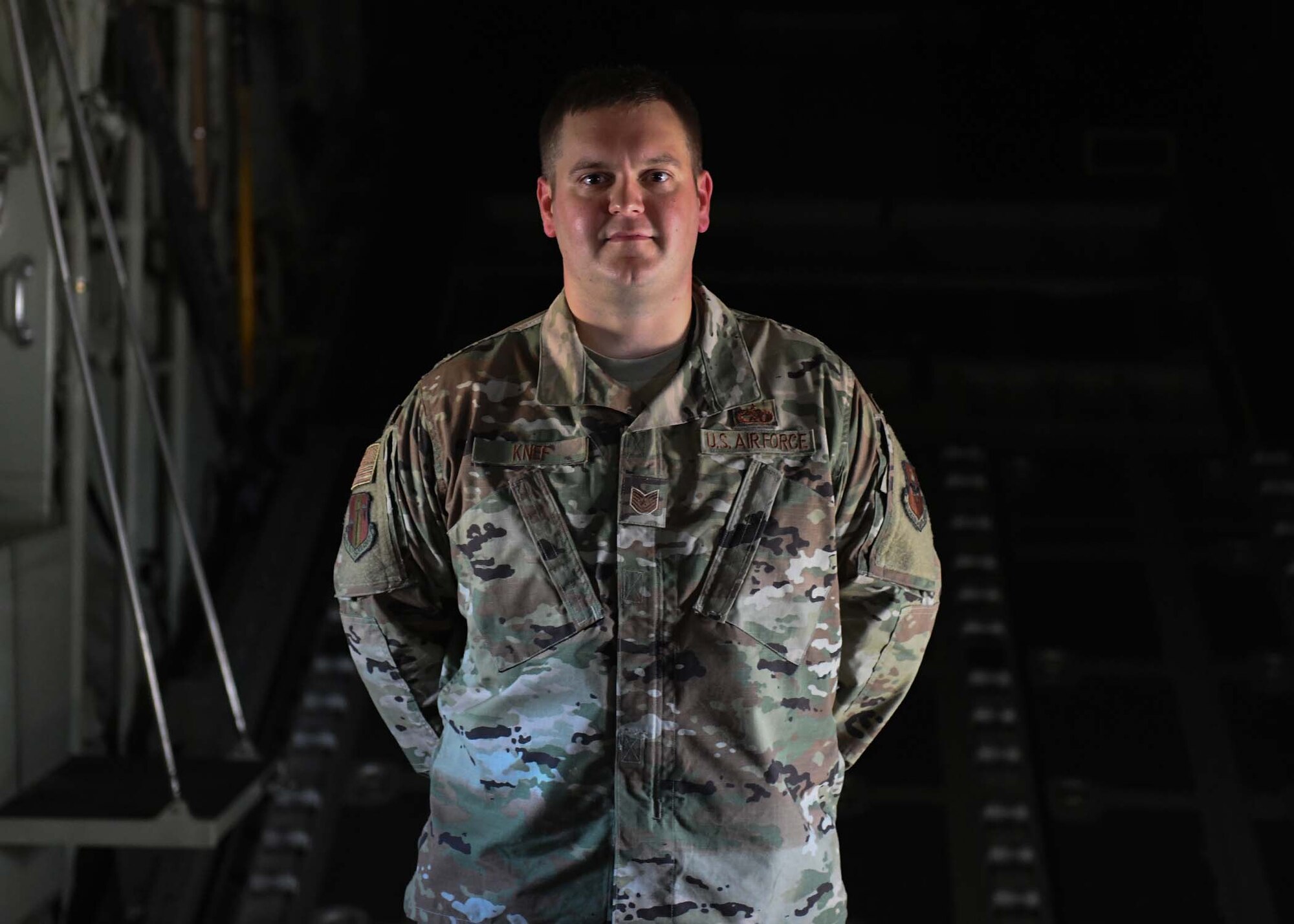 An Airman poses for a photo