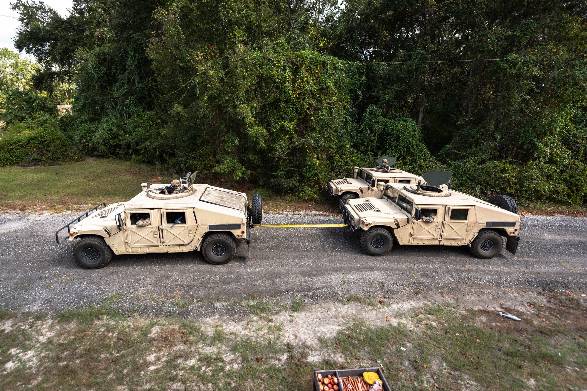 Airmen with the 23d Security Forces Squadron (SFS) conduct vehicle recovery during a field convoy operation Oct. 8, 2019, at Moody Air Force Base, Ga. The field convoy operation gave 23d SFS Airmen an opportunity to improve the ability to shoot, move and communicate, ensuring the Airmen are properly trained and prepared to carry out their mission in a contested environment. (U.S. Air Force photo by Airman 1st Class Taryn Butler)