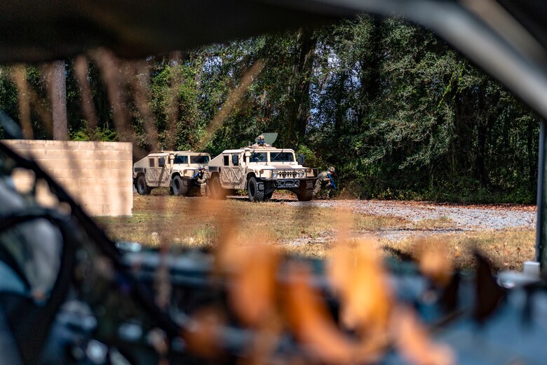 A Humvee convoy scans the area for potential threats during a field convoy operation Oct. 8, 2019, at Moody Air Force Base, Ga. The field convoy operation gave 23d Security Forces Squadron Airmen an opportunity to improve the ability to shoot, move and communicate, ensuring the Airmen are properly trained and prepared to carry out their mission in a contested environment. (U.S. Air Force photo by Airman 1st Class Taryn Butler)