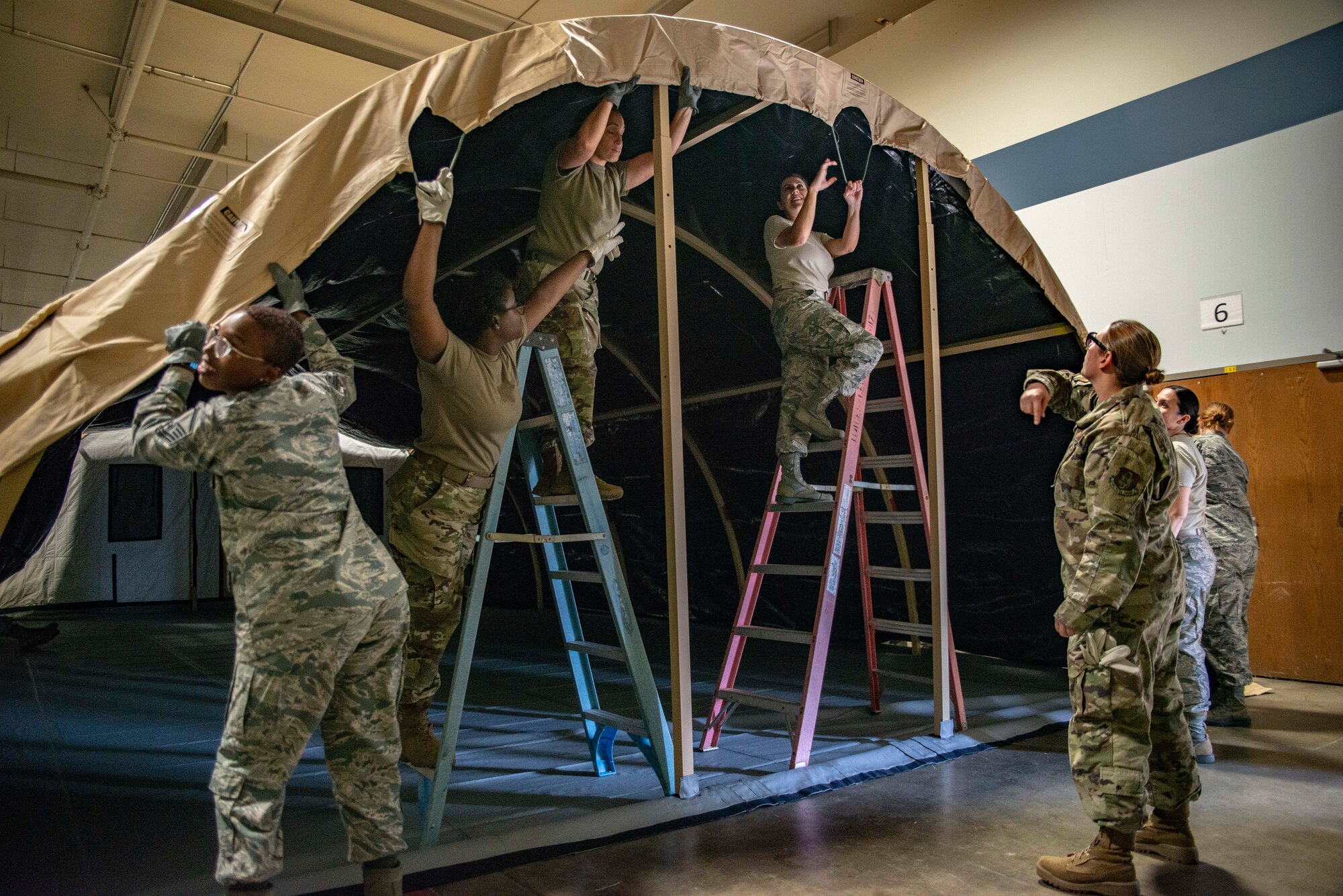 913th Force Support Squadron practices tent build operations at Little Rock Air Force Base, Ark, Oct. 6, 2019. The ability to properly prepare and build a tent is essential for deployment or humanitarian environments. FSS provides the Air Force a range of services, from quality of life programs to combat support operations. (U.S. Air Force Reserve photo by Senior Airman Chase Cannon)