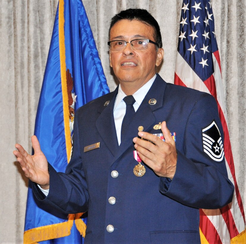 Master Sgt. Robert Sanchez, 340th Flying Training Group education and training chief, reminisces about his career, and thanks guests and teammates for sharing the special day with him, during his Sept. 13 retirement ceremony at Joint Base San Antonio-Randolph, Texas. (U.S. Air Force photo by Janis El Shabazz)