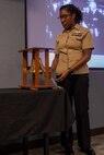 As the petty officer of the watch during Joint Task Force Civil Support’s 244th Navy birthday celebration, U.S. Navy Logistics Specialist 2nd Class Tyler Hearn strikes eight bells. This tradition stems back to the days when Seamen didn’t have personal time pieces. Eight bells signifies the end of a four-hour watch, with each bell signifying 30-minute increments. The theme of this year’s celebration, “No Higher Honor,” originates from a quote by Lt. Cmdr. Robert Copeland, commanding officer of the World War II destroyer USS Samuel B. Roberts (DDE-413). (Official DoD photo by Mass Communication Specialist 3rd Class Michael Redd/RELEASED)