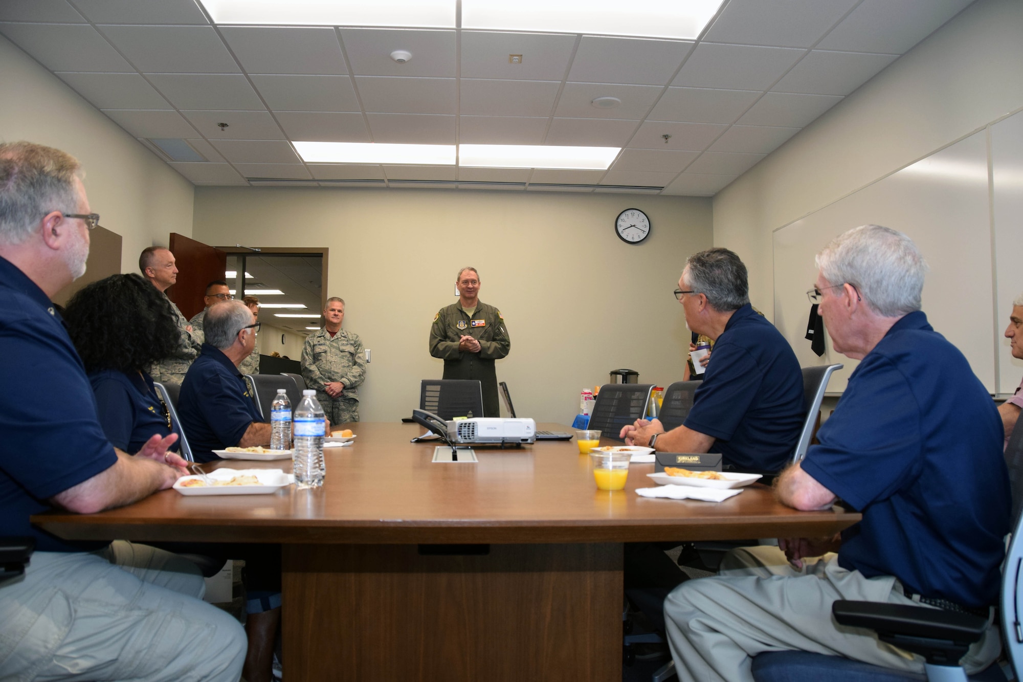 Col. Terry W. McClain, 433rd Airlift Wing commander, welcomes the honorary commanders during a round-table discussion at the start of a tour of the 433rd Medical Group at Joint Base San Antonio-Lackland, Texas Oct. 5, 2019.