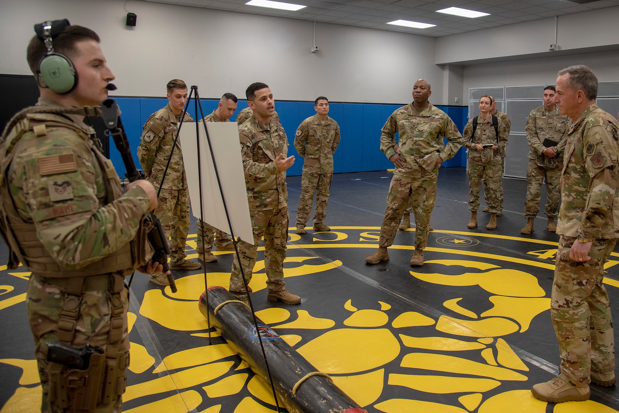 U.S. Air Force Tech. Sgt. Gabriel Rosario, Raven Program Managers Course and flyaway security NCO in charge assigned to the 421st Combat Training Squadron, talks about what students learn in the Phoenix Raven Qualification Course with Air Force Chief of Staff Gen. David L. Goldfein and Chief Master Sgt. of the Air Force Kaleth O. Wright during their visit to the U.S. Air Force Expeditionary Center as part of 2019 Fall Phoenix Rally, Oct. 9, 2019, at Joint Base McGuire-Dix-Lakehurst, New Jersey.  Fall Phoenix Rally is a three-day summit focused on understanding leadership roles in emerging issues with Air Mobility Command, bringing together leadership and spouses from throughout the command.