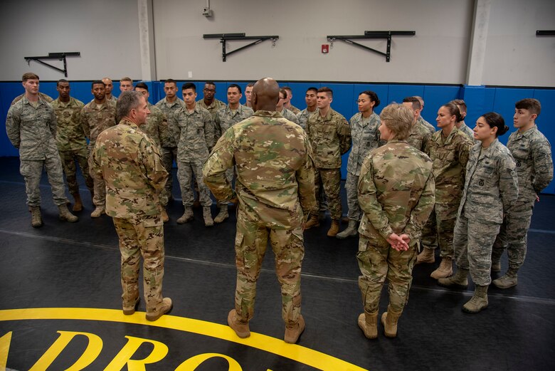 Air Force Chief of Staff Gen. David L. Goldfein, Chief Master Sgt. of the Air Force Kaleth O. Wright and U.S. Air Force Gen. Maryanne Miller, commander of Air Mobility Command, talks to Phoenix Raven Qualification Course 2020 Alpha about the importance of becoming a Raven during their visit to the U.S. Air Force Expeditionary Center as part of 2019 Fall Phoenix Rally, Oct. 9, 2019, at Joint Base McGuire-Dix-Lakehurst, New Jersey. Fall Phoenix Rally is a three-day summit focused on understanding leadership roles in emerging issues with AMC, bringing together leadership and spouses from throughout the command