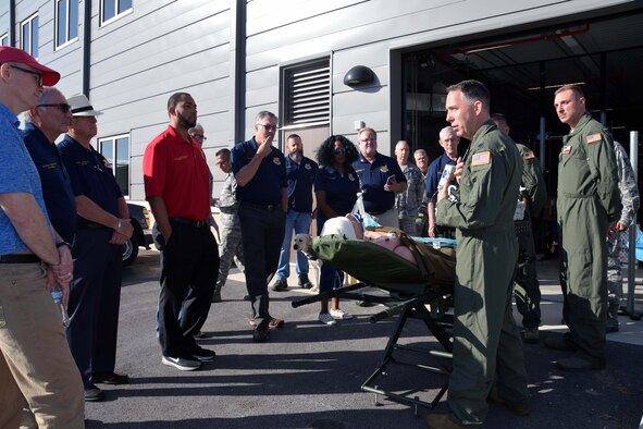 Lt. Col. Eric K. Wilke, 433rd Medical Squadron emergency services physician, briefs 433rd Airlift Wing honorary commanders on lifesaving medical equipment used by Reserve Citizen Airmen during patient transport in medivac aircraft Oct. 5, 2019 at Joint Base San Antonio-Lackland, Texas.