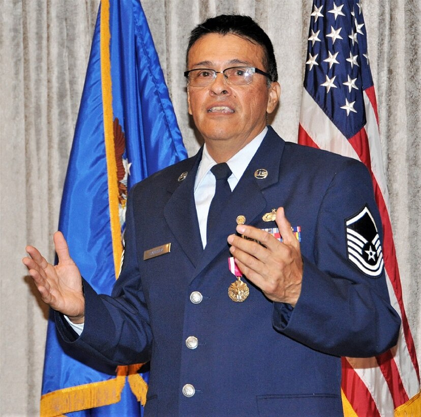 Master Sgt. Robert Sanchez, 340th Flying Training Group education and training chief, reminisces about his career, and thanks guests and teammates for sharing the special day with him, during his Sept. 13 retirement ceremony at Joint Base San Antonio-Randolph, Texas. (U.S. Air Force photo by Janis El Shabazz)
