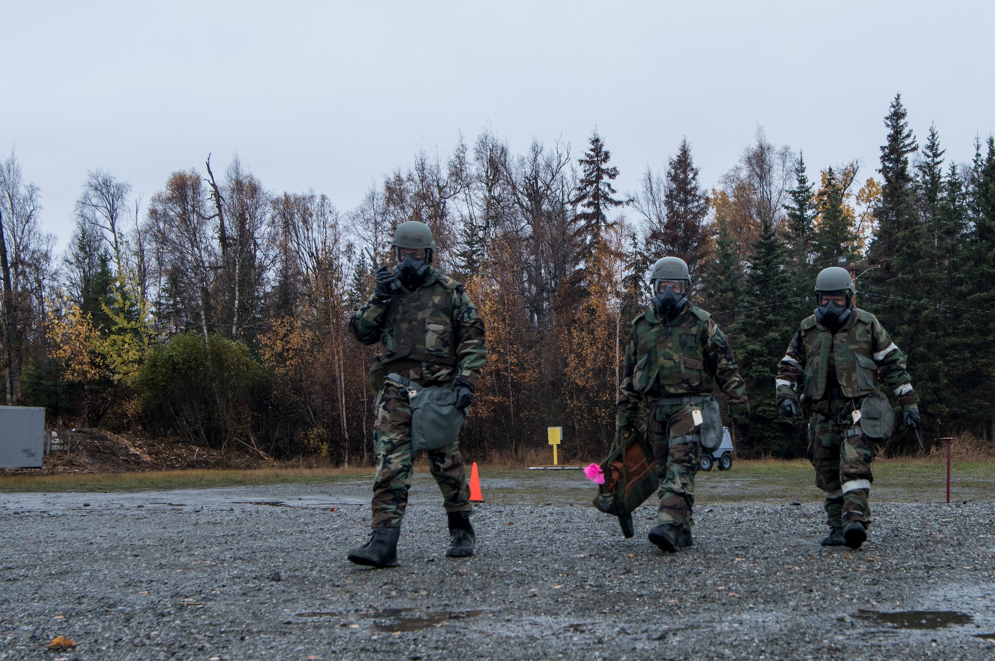 U.S. Airmen, assigned to the 673d Air Base Wing, finish reconnaissance measures in mission-oriented protective posture level 4, in a simulated hazardous environment during a training and readiness exercise, Polar Force 20-1, at Joint Base Elmendorf-Richardson, Alaska, Oct. 9, 2019. Designed to test JBER’s mission readiness, Polar Force 20-1 is a two-week exercise that hones Airmen’s skills and experience when facing adverse situations. Airmen refined their contingency tactics, techniques and procedures in support of the Pacific Air Force’s Agile Combat Employment concept of operations. Agile Combat Support excellence yields multi-domain operations success.