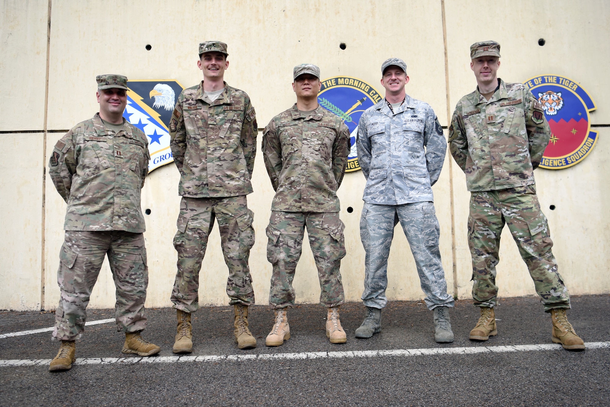 Captain James Henry, 694th Intelligence, Surveillance and Reconnaissance Group chaplain, (far left), Staff Sgt. Marcus Walker, 694th ISR religious affairs airman, (left), Tech. Sgt. Jin Lee, 694th ISRG medical technician, (middle), Master Sgt. Aaron Hurd, 694th ISRG mental health technician, (right), and Capt. Ryan Montanari, 694th ISRG psychologist, (far right) all make up the Airman Resiliency Team at Osan Air Base, Republic of Korea, and are tasked with the overall mental, physical and spiritual wellbeing of more than 500 Airmen and family members. In previous years, it had been noted that Airmen that worked in the intelligence career field were among the highest risk of suicide or suicide attempts, and this alarming trend led to the development of ARTs being imbedded in ISR groups across the Air Force as a constant resource for these Airmen. The teams consist of a mental health technician, a psychologist, chaplain, religious affairs Airman and a medical technician. (U.S. Air Force photo by Senior Airman Denise M. Jenson)