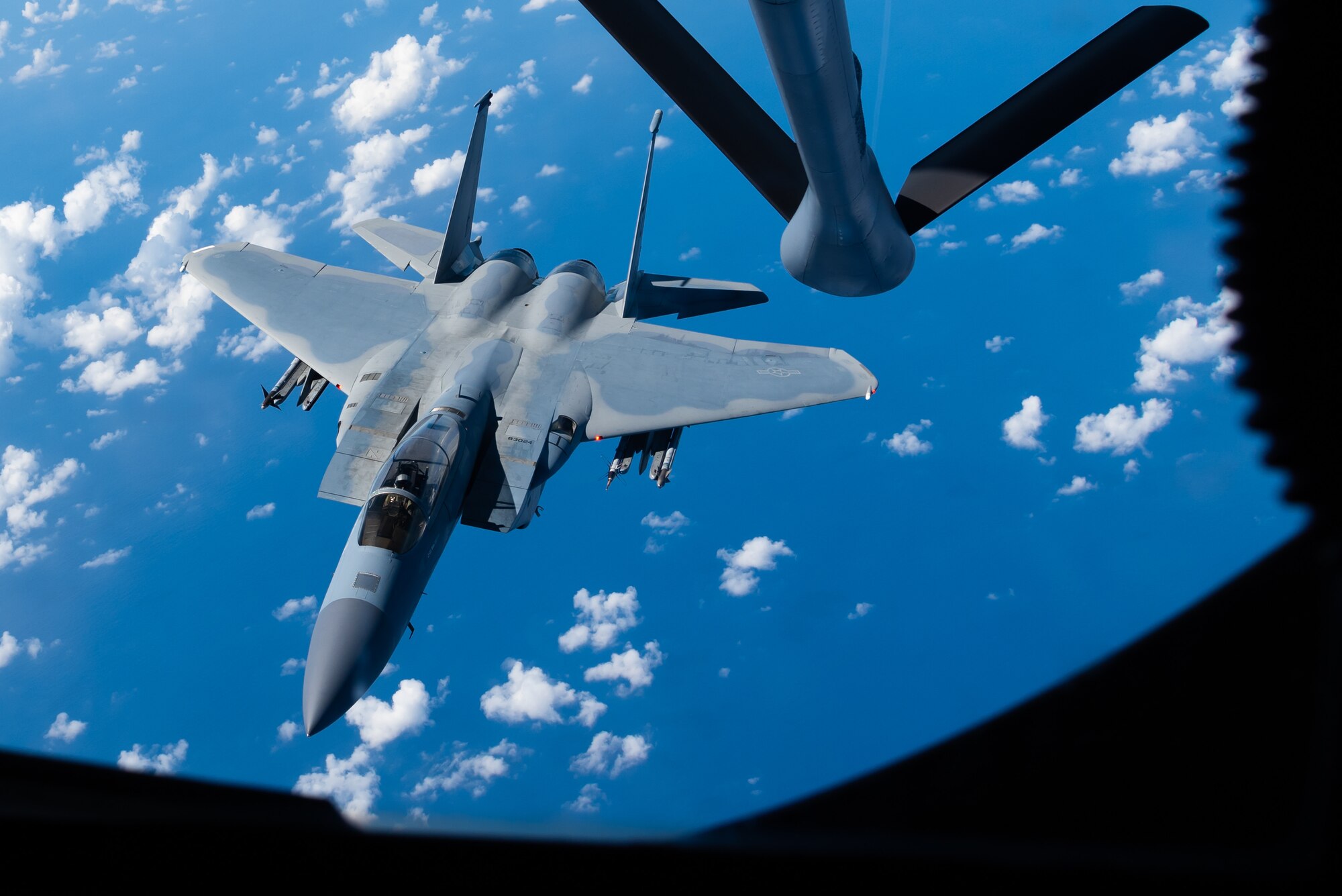 An F-15C Eagle from the 44th Fighter Squadron prepares to refuel with a KC-135 Stratotanker from the 909th Air Refueling Squadron Oct. 3, 2019, during a training exercise out of Kadena Air Base, Japan. The Eagle's air superiority is achieved through a mixture of maneuverability and acceleration, range, weapons and avionics. (U.S. Air Force photo by Senior Airman Cynthia Belío)