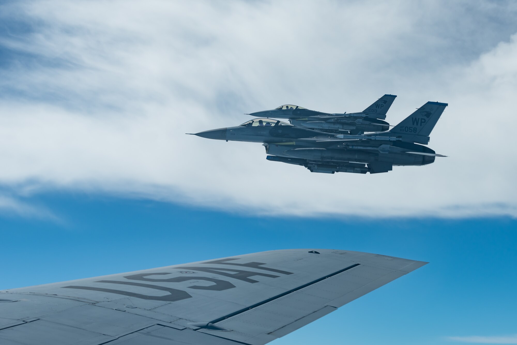 Two F-16C Fighting Falcons from the 8th Fighter Wing, Kunsan Air Base, Republic of Korea, fly during a training exercise Oct. 4, 2019. The Fighting Falcon’s cockpit and its bubble canopy give the pilot unobstructed forward and upward vision and greatly improved vision over the side and to the rear. (U.S. Air Force photo by Senior Airman Matthew Seefeldt)