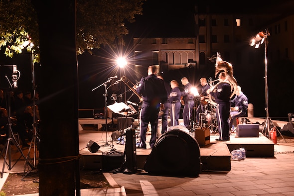 U.S. Air Forces in Europe and Air Forces Africa band, Wings of Dixie, perform an evening concert for the community in Portogruaro, Italy, Oct. 4, 2019. The USAFE-AFAFRICA band showed the communities around Aviano Air Base they live up to their motto as “America’s Musical Ambassadors” of goodwill. (U.S. Air Force photo by Julie Scott)