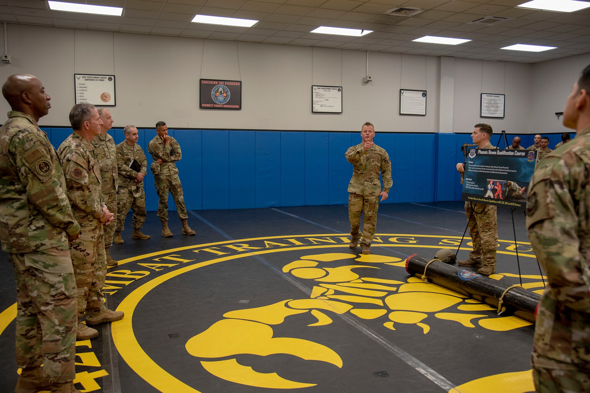 U.S. Air Force Tech. Sgt. Joshua Lipp, Phoenix Raven Qualification Course NCO in charge assigned to the 421st Combat Training Squadron, talks about mission essential equipment needed in different areas of responsibility with Air Force Chief of Staff Gen. David L. Goldfein and Chief Master Sgt. of the Air Force Kaleth O. Wright during their visit to the U.S. Air Force Expeditionary Center as part of 2019 Fall Phoenix Rally, Oct. 9, 2019, at Joint Base McGuire-Dix-Lakehurst, New Jersey. Fall Phoenix Rally is a three-day summit focused on understanding leadership roles in emerging issues with Air Mobility Command, bringing together leadership and spouses from throughout the command