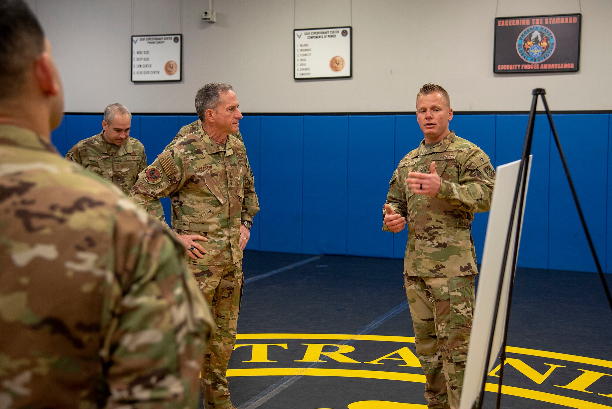U.S. Air Force Tech. Sgt. Joshua Lipp, Phoenix Raven Qualification Course NCO in charge assigned to the 421st Combat Training Squadron, shares course history with Air Force Chief of Staff Gen. David L. Goldfein and Chief Master Sgt. of the Air Force Kaleth O. Wright during their visit to the U.S. Air Force Expeditionary Center as part of 2019 Fall Phoenix Rally, Oct. 9, 2019, at Joint Base McGuire-Dix-Lakehurst, New Jersey. Fall Phoenix Rally is a three-day summit focused on understanding leadership roles in emerging issues with Air Mobility Command, bringing together leadership and spouses from throughout the command