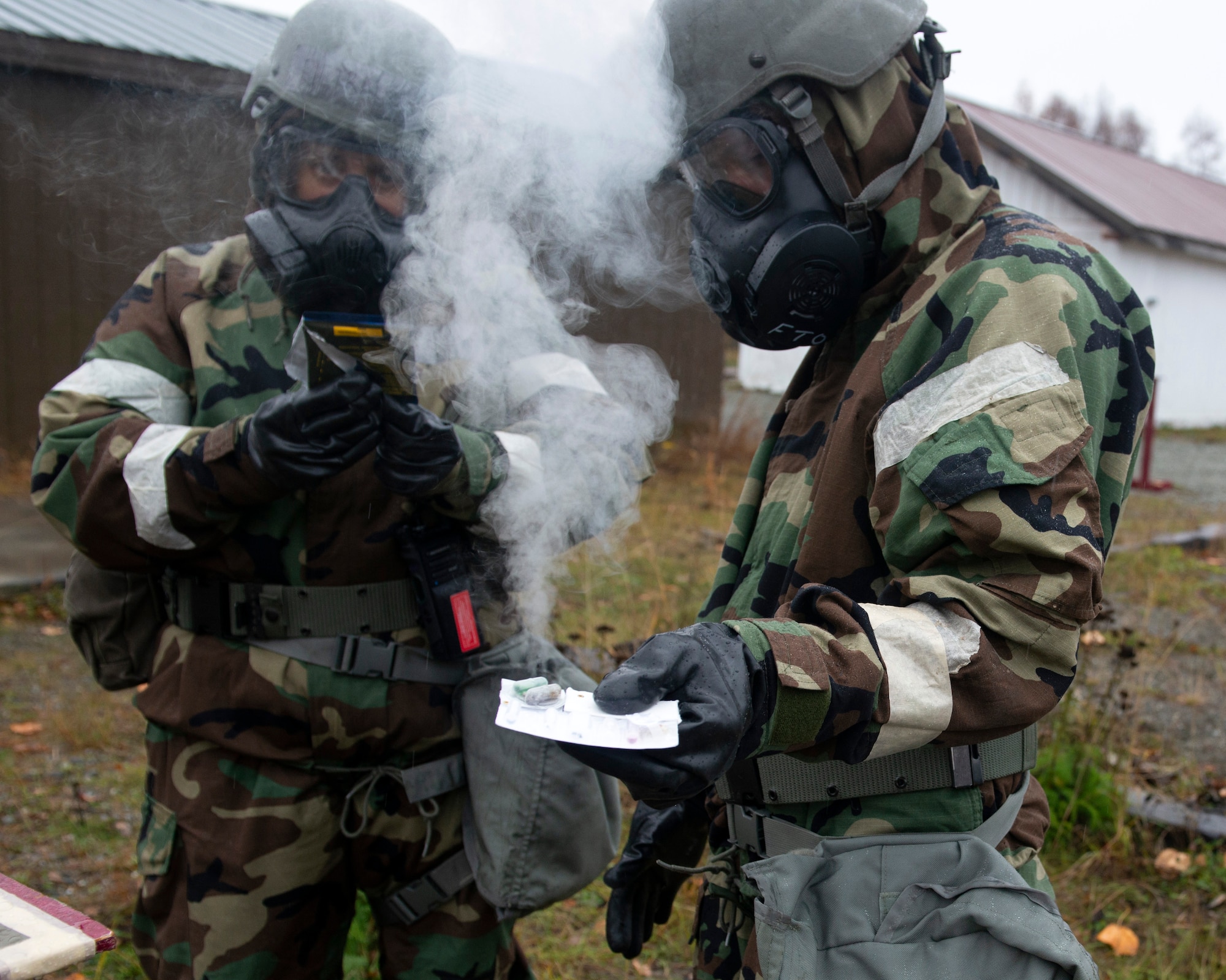 U.S. Airmen assigned to the 673d Air Base Wing use a chemical detection kit in a simulated hazardous environment during Polar Force 20-1 at Joint Base Elmendorf-Richardson, Alaska, Oct. 9, 2019. Designed to test JBER’s mission readiness, Polar Force 20-1 is a two-week exercise that hones Airmen’s skills and experience when facing adverse situations. Airmen refined their contingency tactics, techniques and procedures in support of the Pacific Air Force’s Agile Combat Employment concept of operations. Agile Combat Support excellence yields multi-domain operations success. (U.S. Air Force photo by Airman 1st Class Emily Farnsworth)
