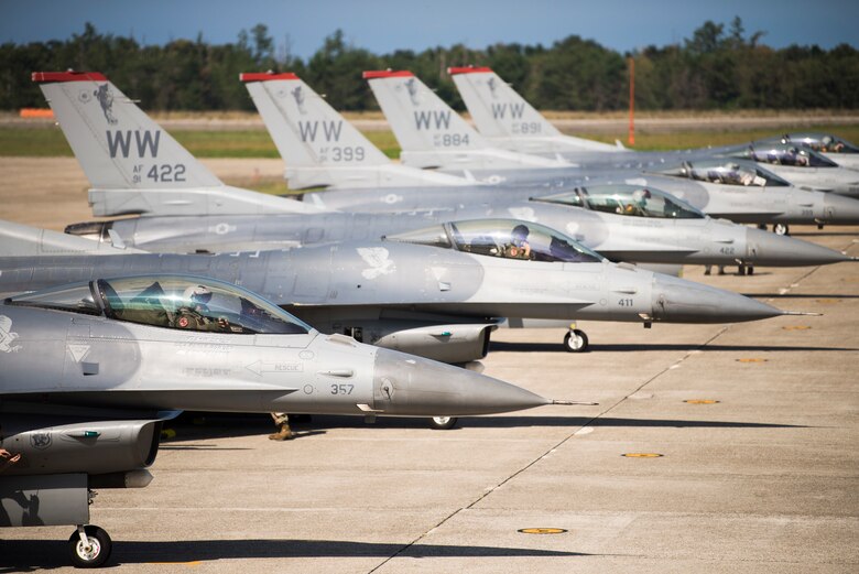 Six U.S. Air Force F-16 Fighting Falcons sit on the flight line during an aviation training relocation at Komatsu Air Base, Japan, Oct. 1, 2019. The pilots spent four days conducting within visual range air-to-air combat training with Japan Air Self-Defense Force pilots increasing tactical strength, friendship and their alliance. (U.S. Air Force photo by Senior Airman Collette Brooks)