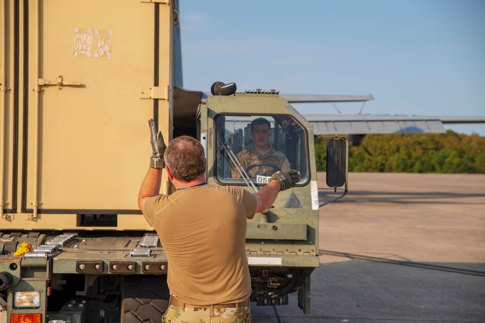 327th Airlift Squadron loadmasters assist in loading a C-130J Hercules before a low altitude training flight on October 5, 2019 at Little Rock Air Force Base, Ark. This training exercise provides aircrew the opportunity to experience multiple types of airdrops and drop zones while instilling tactical techniques and procedures for mobility operations. The robust and detailed training scenario allowed aircrew and air transportation specialists to operate in austere conditions, simulating enemies with an array of capabilities. (U.S. Air Force Reserve photo by Senior Airman Chase Cannon)