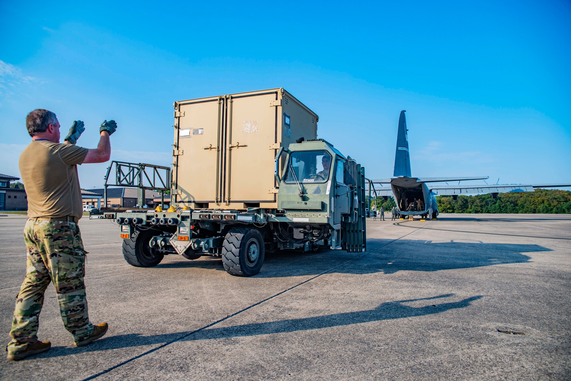 327th Airlift Squadron loadmasters assist in loading a C-130J Hercules before a low altitude training flight on October 5, 2019 at Little Rock Air Force Base, Ark. This training exercise provides aircrew the opportunity to experience multiple types of airdrops and drop zones while instilling tactical techniques and procedures for mobility operations. The robust and detailed training scenario allowed aircrew and air transportation specialists to operate in austere conditions, simulating enemies with an array of capabilities. (U.S. Air Force Reserve photo by Senior Airman Chase Cannon)