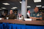 Vice Adm. Bill Merz, commander, U.S. 7th Fleet, and Rear Adm. Didik Setiyono, Assistant Chief of Navy Indonesian Navy, is briefed during staff talks aboard the U.S. 7th Fleet flagship, USS Blue Ridge (LCC 19) October 11, 2019. The Indonesian Navy’s visit to U.S. 7th Fleet headquarters is highlighted by this year’s marking of the 70th anniversary of diplomatic ties between the United States and Indonesia.