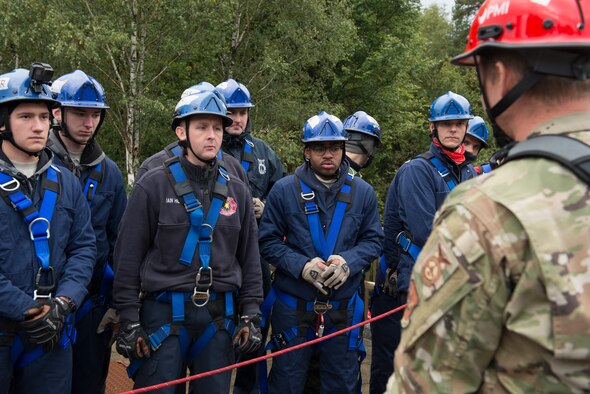 U.S. Air Force Staff Sgt. Robert Wellborn, 435th Construction and Training Squadron fire rescue and contingency training instructor, teaches students about rescuing suspended victims at the 435th CTS compound near Ramstein Air Base, Germany, Oct. 10, 2019. The Rescue Technician I Course is a 15-day course that certifies firefighters on difficult rescue techniques.