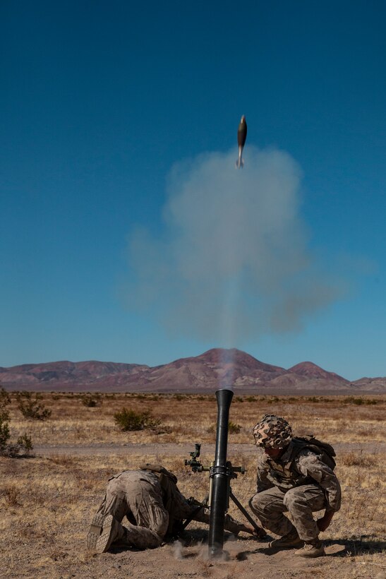 U.S. Marines with 1st Battalion, 6th Marine Regiment, 2nd Marine Division fire M252 81mm mortar systems for a Fire Support Coordination Exercise during Integrated Training Exercise 1-20 at Marine Air Ground Combat Center, Twentynine Palms, Calif., Oct. 4, 2019. The Marines were coordinated by forward observers in fire support teams in conjunction with M777-A2 Howitzers and rotary elements to train for success on a modern battlefield. (U.S. Marine Corps photo by Cpl. Timothy J. Lutz)
