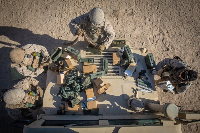 U.S. Marines with Combat Logistics Battalion 8, Combat Logistics Regiment 2, 2nd Marine Logistics Group, prepare ammunition before the motorized operations course as part Integrated Training Exercise 1-20 on Marine Corps Air Ground Combat Center Twentynine Palms, California, Oct. 6, 2019. CLB-8 integrated with 2nd Marine Regiment during ITX to provide direct support and tactical logistics beyond the regiment's organic capabilities in the areas of transportation, field level maintenance, and general engineering.