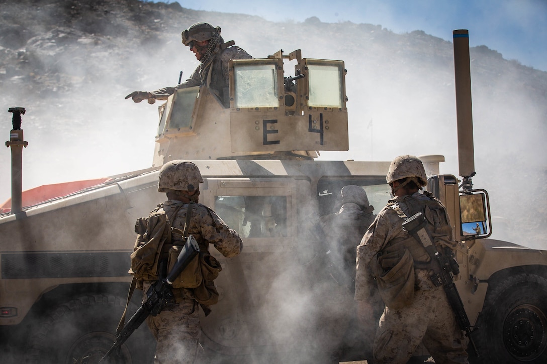 U.S. Marines with Combat Logistics Battalion 8, Combat Logistics Regiment 2, 2nd Marine Logistics Group, pull simulated causalities out of a downed vehicle during motorized operations course as part Integrated Training Exercise 1-20 on Marine Corps Air Ground Combat Center Twentynine Palms, California, Oct. 6, 2019. CLB-8 integrated with 2nd Marine Regiment during ITX to provide direct support and tactical logistics beyond the regiment's organic capabilities in the areas of transportation, field level maintenance, and general engineering.