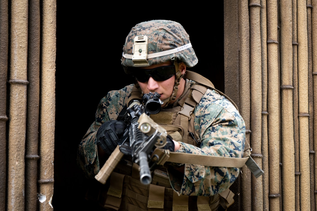U.S. Marine Lance Cpl. Chandler Blanton advances to clear a building during military operations in urban terrain training as part of exercise Fuji Viper 20.1 on Camp Fuji, Japan, Oct. 7, 2019. Fuji Viper is a regularly scheduled training evolution for infantry units units assigned to 3rd Marine Division as part of the unit deployment program. The training allows units to maintain their lethality and proficiency in infantry and combined arms tactics. Blanton is assigned to 4th Marine Regiment, 3rd Marine Division, and a native of Pensacola, Fla.