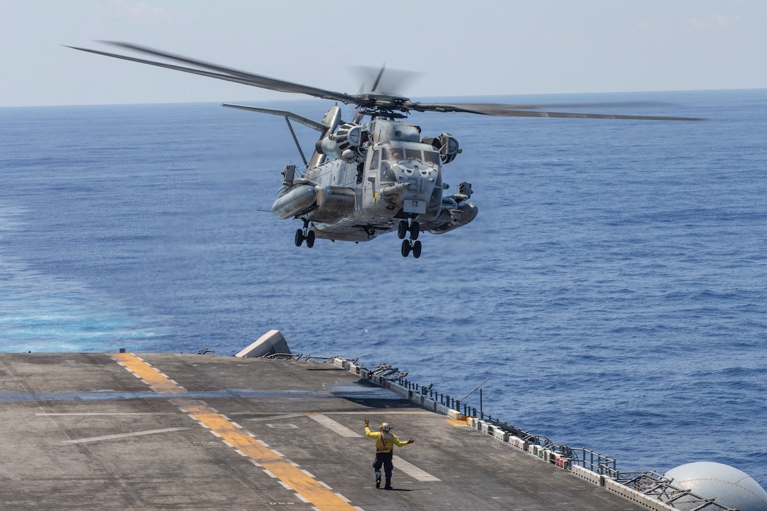 A CH-53E Super Stallion with Marine Medium Tiltrotor Squadron163, 11th Marine Expeditionary Unit, takes off of the flight deck of the amphibious assault ship USS Boxer during a vertical replenishment-at-sea. The Marines and Sailors of the 11th MEU are deployed to the 7th Fleet area of operations to support regional stability, reassure partners, and allies, and maintain a presence postured to respond to any crisis ranging from humanitarian assistance to contingency operations.