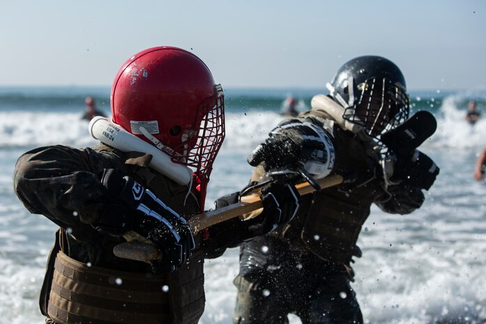 U.S. Marines from Marine Corps Air Station Miramar spar in the ocean during Marine Corps martial arts instructor course 224-19 at Naval Air Station North Island, Calif., Oct. 9. 2019. The three-week MAI course trains marines to become martial arts instructors.