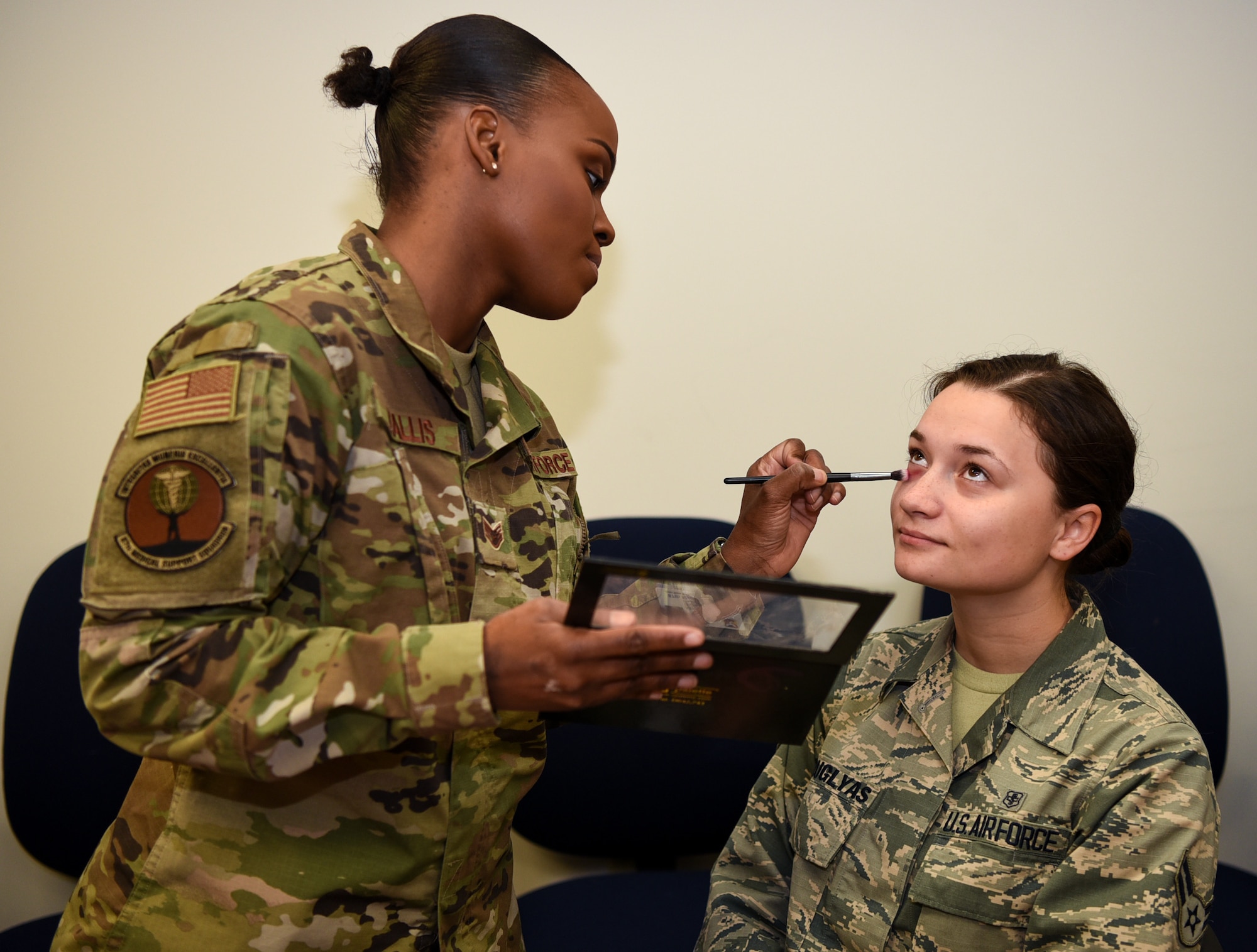 Volunteers use makeup to emulate a black eye as part of a Family Advocacy Program initiative called “The Black Eye Project” on Joint Base McGuire-Dix-Lakehurst, New Jersey, Oct. 9, 2019. The volunteers went about their normal routines around base with a fake black eye as an experiment to see who would inquire about the individuals’ wellbeing and who avoided it. The goal is to help the community learn how to speak out and recognize symptoms of domestic violence which is severely under-reported, according to Family Advocacy. Within five hours, 50 people approached the volunteers— five were outside of their workplace. While many asked with concern, some initially approached with inappropriate jokes or comments. Two volunteers entered the installation through three separate gates and were not questioned. “We hope to use this as a learning experience for people to start a conversation,” said Christina Hernandez, 87th Family Advocacy Program domestic abuse victim advocate. “Be aware, ask the question even if it’s uncomfortable. Family violence thrives in silence and isolation and it’s the job of all of us to shine a light and show survivors that they are not alone.” (U.S. Air Force photos by Airman 1st Class Ariel Owings)