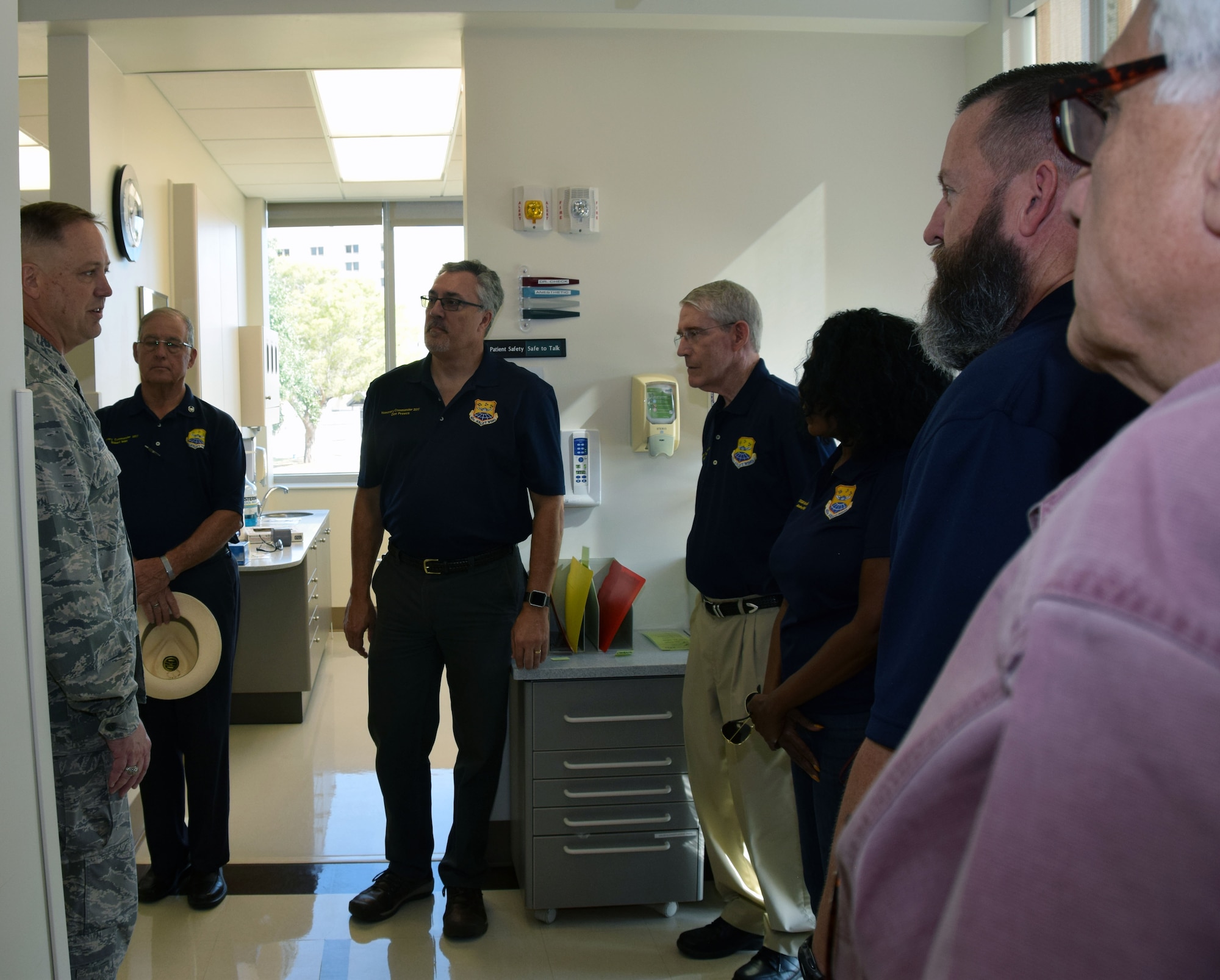 Lt. Col. Michael J. Bates, 433rd Aerospace Medicine Squadron dentist, guides 433rd honorary commanders for an inside look at the Air Force Postgraduate Dental School and Clinic during a tour of the facility Oct. 5, 2019 at Joint Base San Antonio-Lackland, Texas.