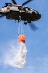 Members of West Virginia Army National Guard Company C, 1st Battalion, 150th Aviation Regiment, train at Camp Dawson, West Virginia, Oct. 10, 2019, using helicopter buckets to fight wildfires.