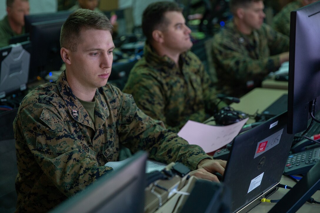 Marine Capt. Zachariah A. Gober inputs data onto a computer during Exercise Pegasus Flight at Marine Corps Air Station Cherry Point, North Carolina, Oct. 1, 2019. Marine Tactical Air Command Squadron 28 supported Pegasus Flight by planning, commanding, directing and supervising all air operations as the tactical air command center for the exercise. Gober is an air support control officer with MTACS-28, Marine Air Control Group 28, 2nd Marine Aircraft Wing. (U.S. Marine Corps photo by Pfc. Steven M. Walls)