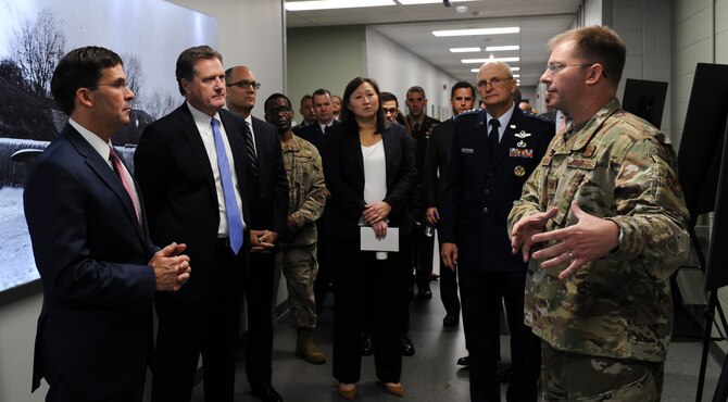 Col. Parker Wright, National Air and Space Intelligence Center commander, briefs Secretary of Defense Dr. Mark T. Esper during his visit to Wright-Patterson Air Force Base, Ohio on Oct. 4, 2019. While at NASIC, Esper also met with Airmen from the center’s Foreign Materiel Exploitation Squadron.