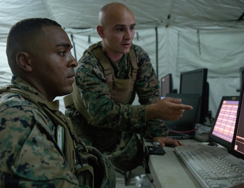 Marines assigned to Marine Air Control Squadron 2 utilize a radar system during Exercise Pegasus Flight at Marine Corps Air Station Cherry Point, North Carolina, Oct. 1, 2019. MACS-2 supported Pegasus Flight by providing air surveillance, airspace management, identifying and classifying radar tracks as the tactical air operations center for the exercise. MACS-2 is a part of Marine Air Control Group 28, 2nd Marine Aircraft Wing. (U.S. Marine Corps photo by Pfc. Steven M. Walls)