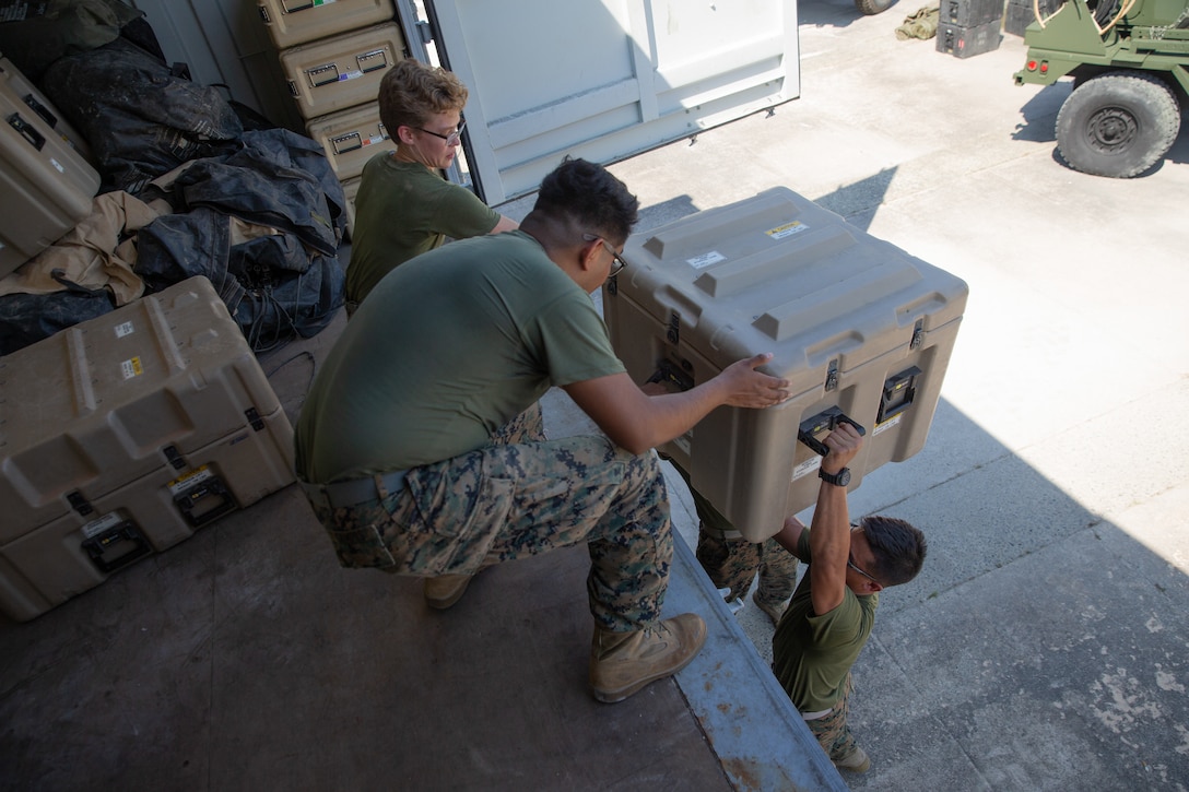 Marines assigned to Marine Air Control Squadron 2 pack up a communications system during Exercise Pegasus Flight at Marine Corps Air Station Cherry Point, North Carolina, Oct. 2, 2019. MACS-2 supported Pegasus Flight by providing air surveillance, airspace management, identifying and classifying radar tracks as the tactical air operations center for the exercise. MACS-2 is a part of Marine Air Control Group 28, 2nd Marine Aircraft Wing. (U.S. Marine Corps photo by Pfc. Steven M. Walls)