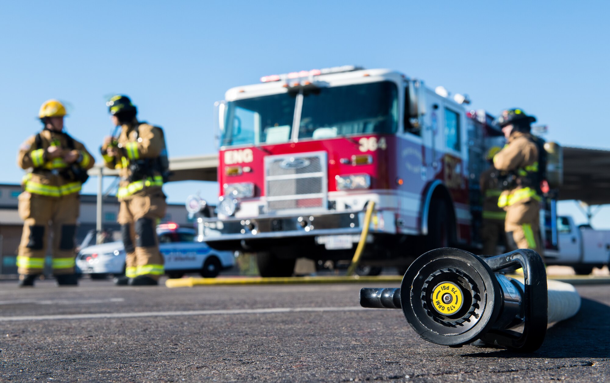 Firefighters from the 56th Civil Engineer Squadron respond to a simulated fuel spill during an exercise Oct. 4, 2019, at Luke Air Force Base, Ariz.