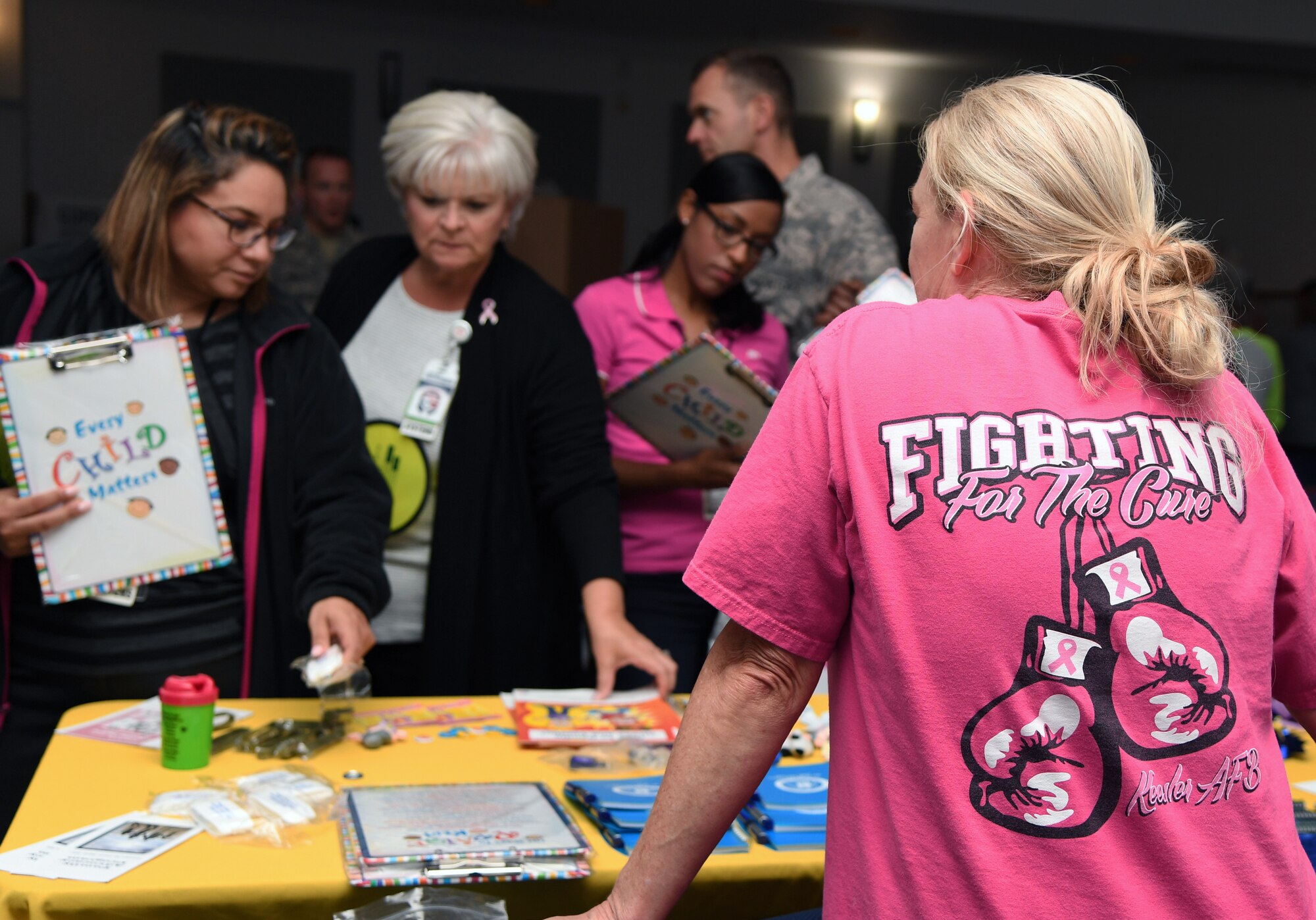 Keesler personnel attends the 81st Medical Group Health Expo inside the Keesler Medical Center at Keesler Air Force Base, Mississippi, Oct. 4, 2019. The 81st MDG hosted the walk-in event which included screenings for multiple types of cancer and chronic diseases in honor of Breast Cancer Awareness Month. (U.S. Air Force photo by Kemberly Groue)