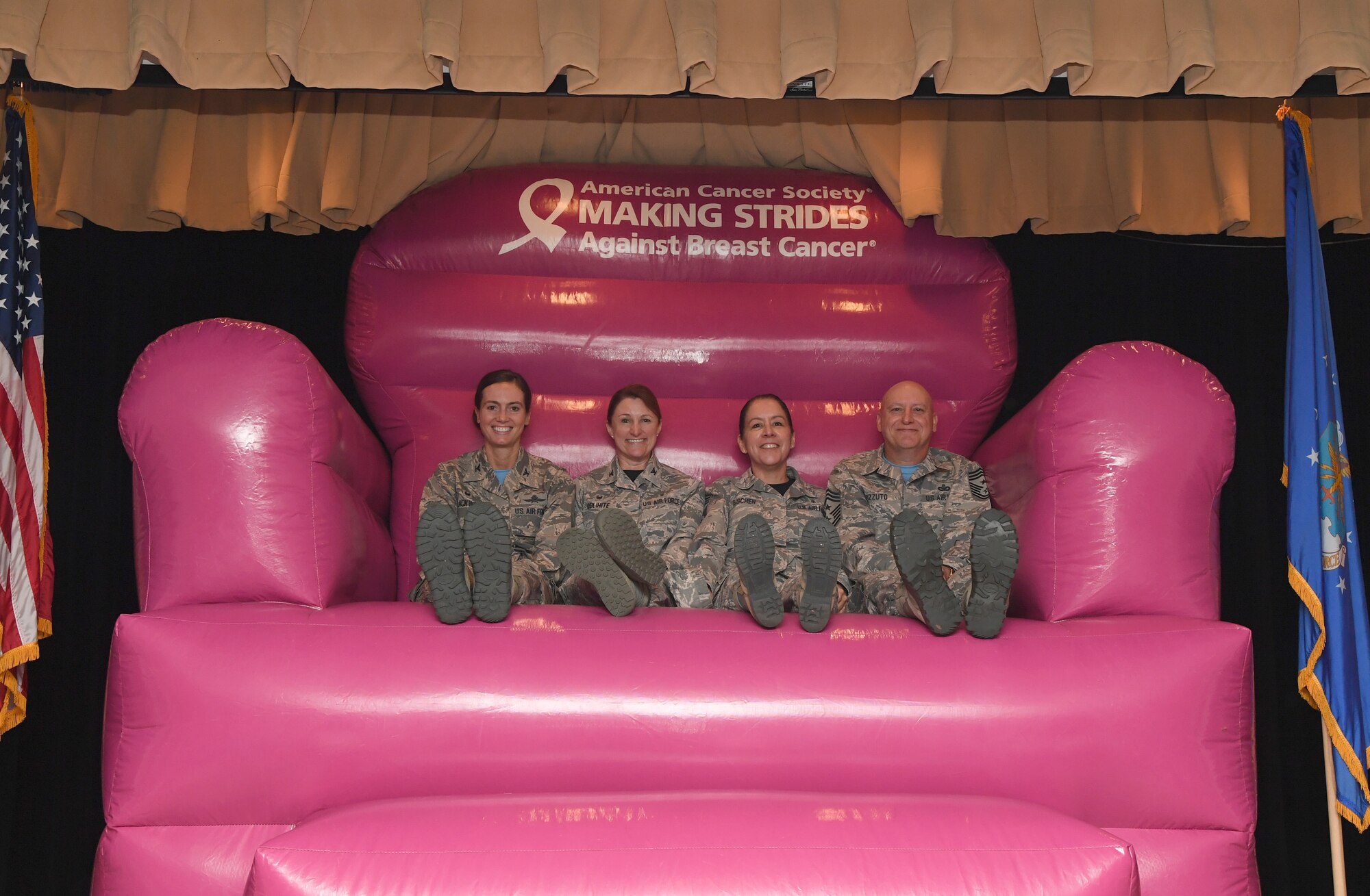 Keesler leadership poses for a photo during the 81st Medical Group Health Expo inside the Keesler Medical Center at Keesler Air Force Base, Mississippi, Oct. 4, 2019. The 81st MDG hosted the walk-in event which included screenings for multiple types of cancer and chronic diseases in honor of Breast Cancer Awareness Month. (U.S. Air Force photo by Kemberly Groue)