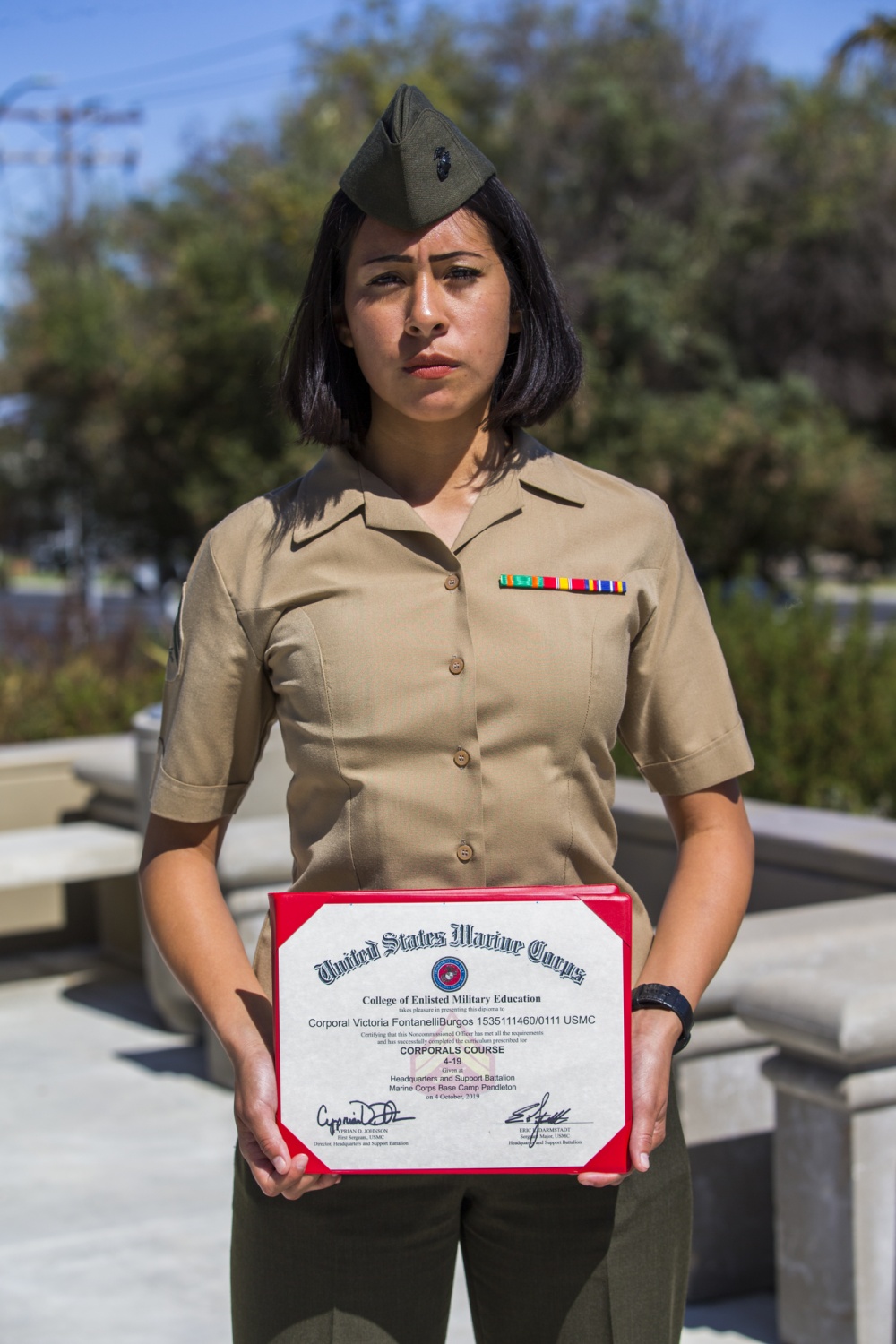 U.S. Marine Corps Cpl. Victoria Fontanelli, an administrative specialist with 13th Marine Expeditionary Unit Command Element, holds her diploma after completing Corporals Course, at Marine Corps Base Camp Pendleton, Calif., Oct. 4, 2019. Corporals Course’s mission is to provide the Marine Corporal with the education and leadership skills necessary to lead Marines in any clime and place. Fontanelli, a native of Henderson, Nev., graduated from Sierra Vista High School and was subsequently recruited out of Marine Corps Recruiting Command Sub Station West Vegas. (U.S. Marine Corps Photo by Cpl. Brendan Custer)