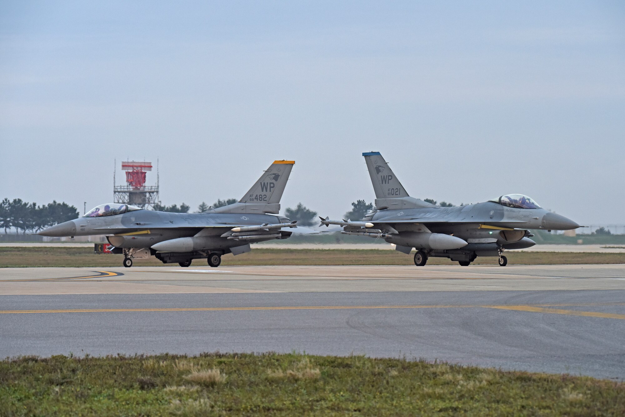U.S. Air Force F-16 Fighting Falcons assigned to the 8th Fighter Wing prepare to take-off for a routine training flight at Kunsan Air Base, Republic of Korea, Oct. 10, 2019. The 8th FW is home to two fighter squadrons, the 35th Fight Squadron “Pantons” and 80th FS “Juvats.” They perform air and space control roles including counter air, strategic attack, interdiction and close-air support missions. (U.S. Air Force photo by Staff Sgt. Mackenzie Mendez)