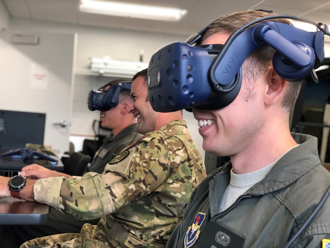 Students and an instructor pilot with the 23rd Flying Training Squadron's Specialized Undergraduate Pilot Training - Helicopter Class 20-02 take part in a virtual reality sortie at Fort Rucker, Ala., Oct. 9, 2019.  The class incorporated VR into the experimental curriculum on day one of training, transforming the learning environment. The class graduated Oct. 11, six weeks earlier than normal. (U.S. Air Force courtesy photo)