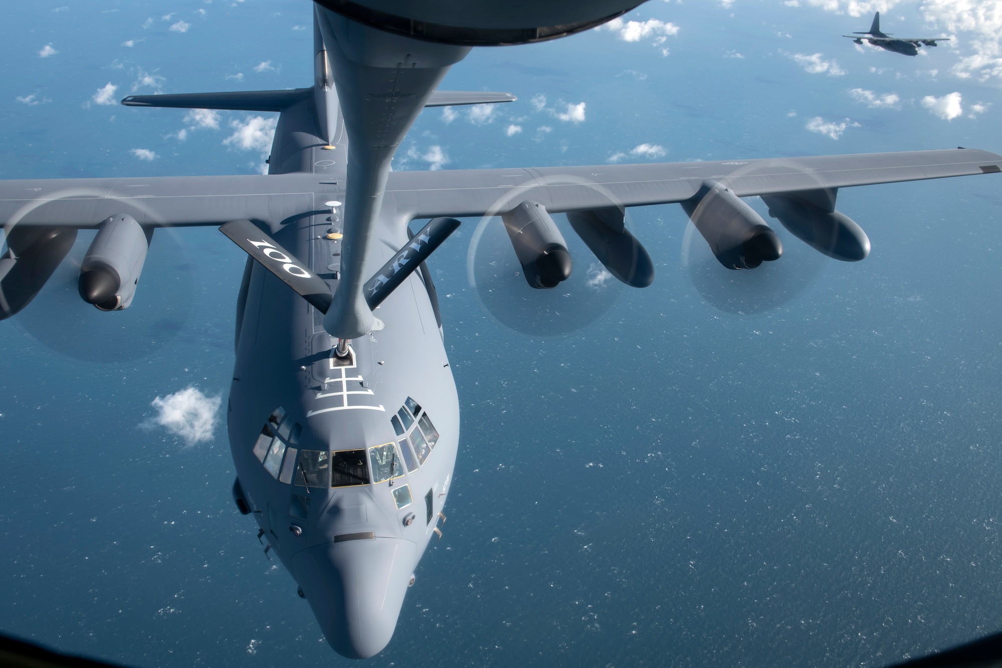 An MC-130J Commando II assigned to the 352d Special Operations Wing, RAF Mildenhall, England receives fuel from a KC-135 Stratotanker from the 100th Air Refueling Wing, RAF Mildenhall, England, Oct. 10, 2019.