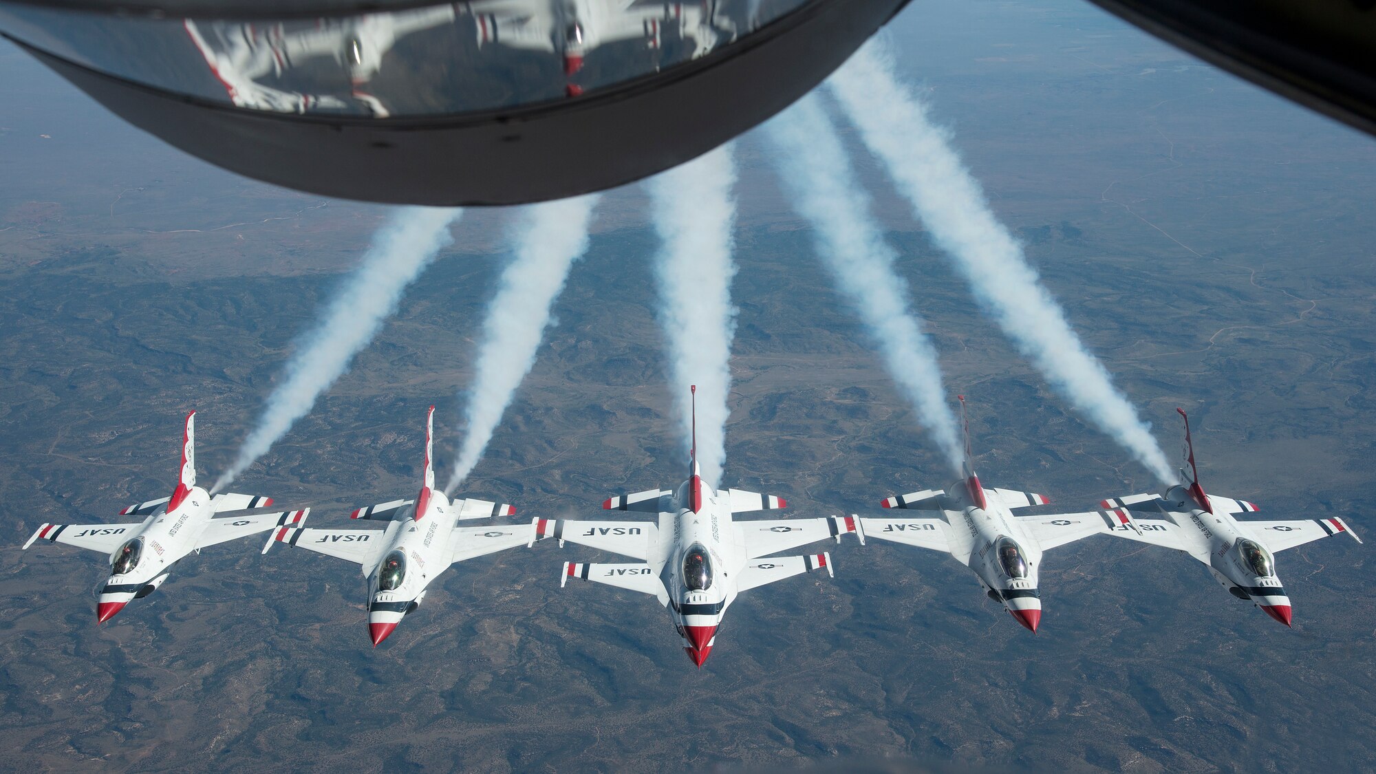 The United States Air Force Air Demonstration Squadron “Thunderbirds” fly in formation after being refueled by the 50th Air Refueling Squadron from MacDill Air Force Base, Fla., Oct. 14, 2019. The Thunderbirds are a flying aerobatic team that performs at air shows around the world.