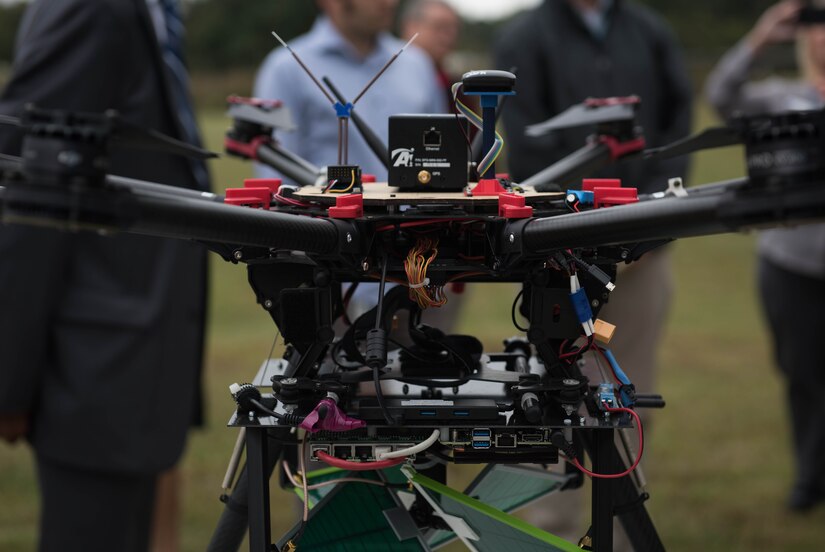 A drone, part of NASA’s City Environment for Range Testing of Autonomous Integrated Navigation, or CERTAIN program, sits on display at the test range at the Langley Research Center in Virginia, Oct. 9, 2019. Visitors learned about the drone’s capabilities during a tour of the LaRC CERTAIN facility and test range. (U.S. Air Force photo by Airman 1st Class Sarah Dowe)