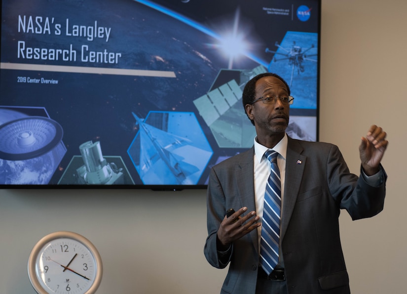 Clayton Turner, director of the NASA Langley Research Center, gives a presentation about the center’s mission to Joint Base Langley-Eustis leadership and senate representatives at NASA’s LaRC in Hampton, Virginia, Oct. 9, 2019. Visitors toured one of NASA LaRC’s newest state-of-the-art facilities, the Flight Dynamic Research Facility, viewed the historic aircraft hangar where astronauts prepared for the first lunar expeditions, and met with researchers and developers form NASA’s City Environment for Range Testing of Autonomous Integrated Navigation or CERTAIN program. NASA marked its centennial in 2017. (U.S. Air Force photo by Airman 1st Class Sarah Dowe)