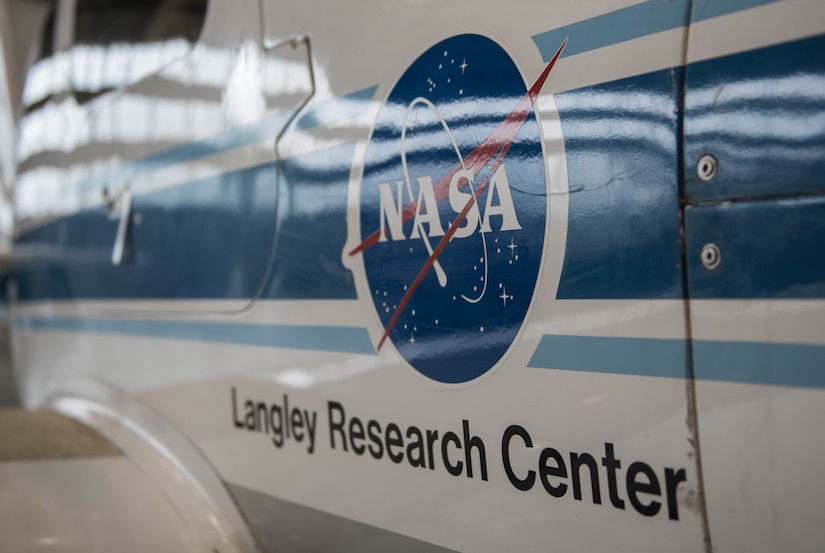 The NASA insignia has become a staple in pop culture and can be seen all around the Langley Research Center campus. The round shape of the NASA insignia represents a planet, the stars represent space, the red V-shaped wing represents aeronautics, and the circular orbit around the agency’s name represents space travel on a plane at the Langley Research Center in Hampton, Virginia, Oct. 9, 2019. The LaRC promotes advancement in aviation, science, education, innovation, development of technology for space exploration and improve economic vitality and stewardship of the Earth. (U.S. Air Force photo by Airman 1st Class Sarah Dowe)
